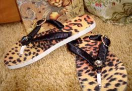Chinelo onça pintada